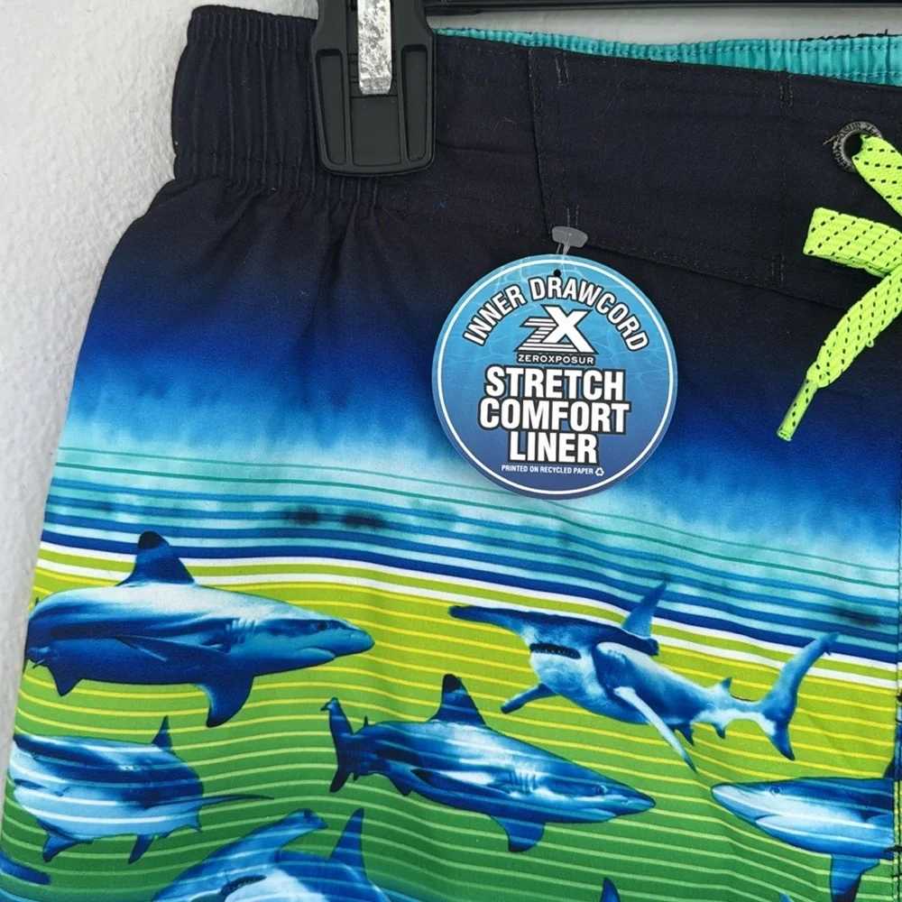 Zero Xposur blue green shark print swim trunks and goggles set size 14/16